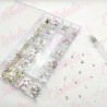 Decoración con cristales en diferentes tamaños AB-TORNASOL y katana para uñas, en estuche rígido aprox de 12.5x 24.5cm con 20 di