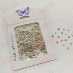 Decoración CRISTAL de plástico color CHAMPAGNE CAMALEON en diferentes tamaños para uñas, aprox 600 piezas en sobre de 11.5x7cm, 