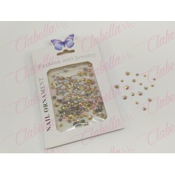 Decoración CRISTAL de plástico color CHAMPAGNE CAMALEON en diferentes tamaños para uñas, aprox 600 piezas en sobre de 11.5x7cm, 