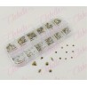 Decoración CRISTALES DORADO METALIZADO CON FIGURAS para uñas, aprox 400 piezas en pastillero – estuche de plástico de 13x5cm con