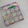 Decoración FIGURAS NO MEZCLADAS estrellas, corazones, mariposas, BRILLA COLOR CAMALEÓN, para uñas 12 piezas de 1/8 por estuche, 